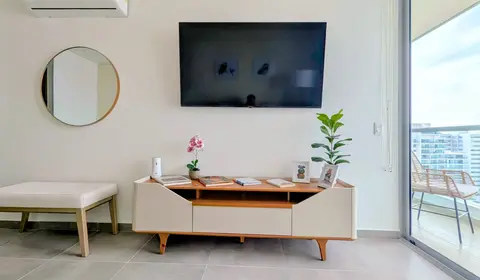 Cozy entertainment nook featuring a smart TV.