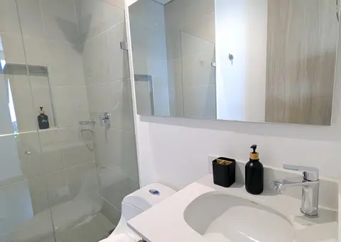 Sparkling clean secondary bathroom fully stocked.
