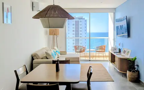 Comfort meets coastal elegance in our open living space.